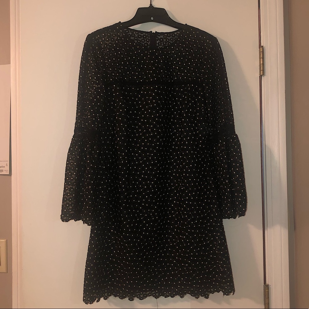 Black trumpet sleeve dress